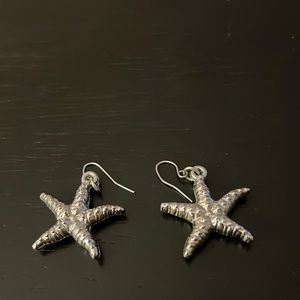 Star shaped silver earrings